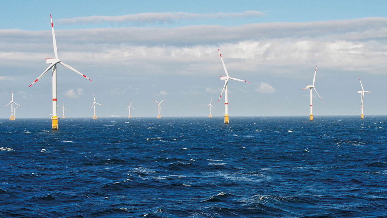 Photo of an offshore wind farm.